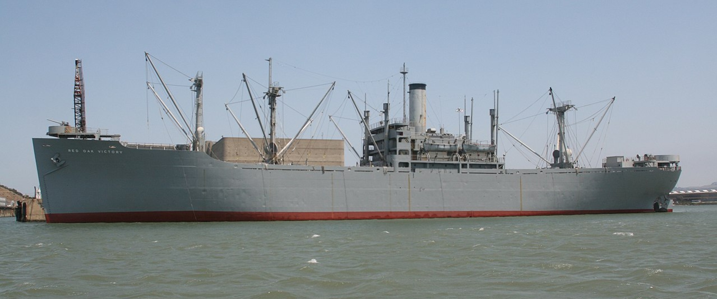The SS Red Oak Victory in 2013, after repair and refurbishment in 2011. At the time of this image, she is the last operational Victory ship in the world. Used extensively during World War II for transport of various goods, the Victory class was a faster a